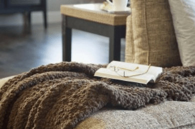 Snuggly blanket on couch